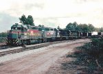 Seaboard System GP38-2 #6050 and GP40's #6675, 6647 & 6692 leads northbound long-distance local #510 into the yard 